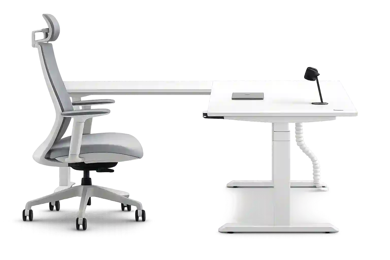 Height adjustable office desk with ergonomic office chair.