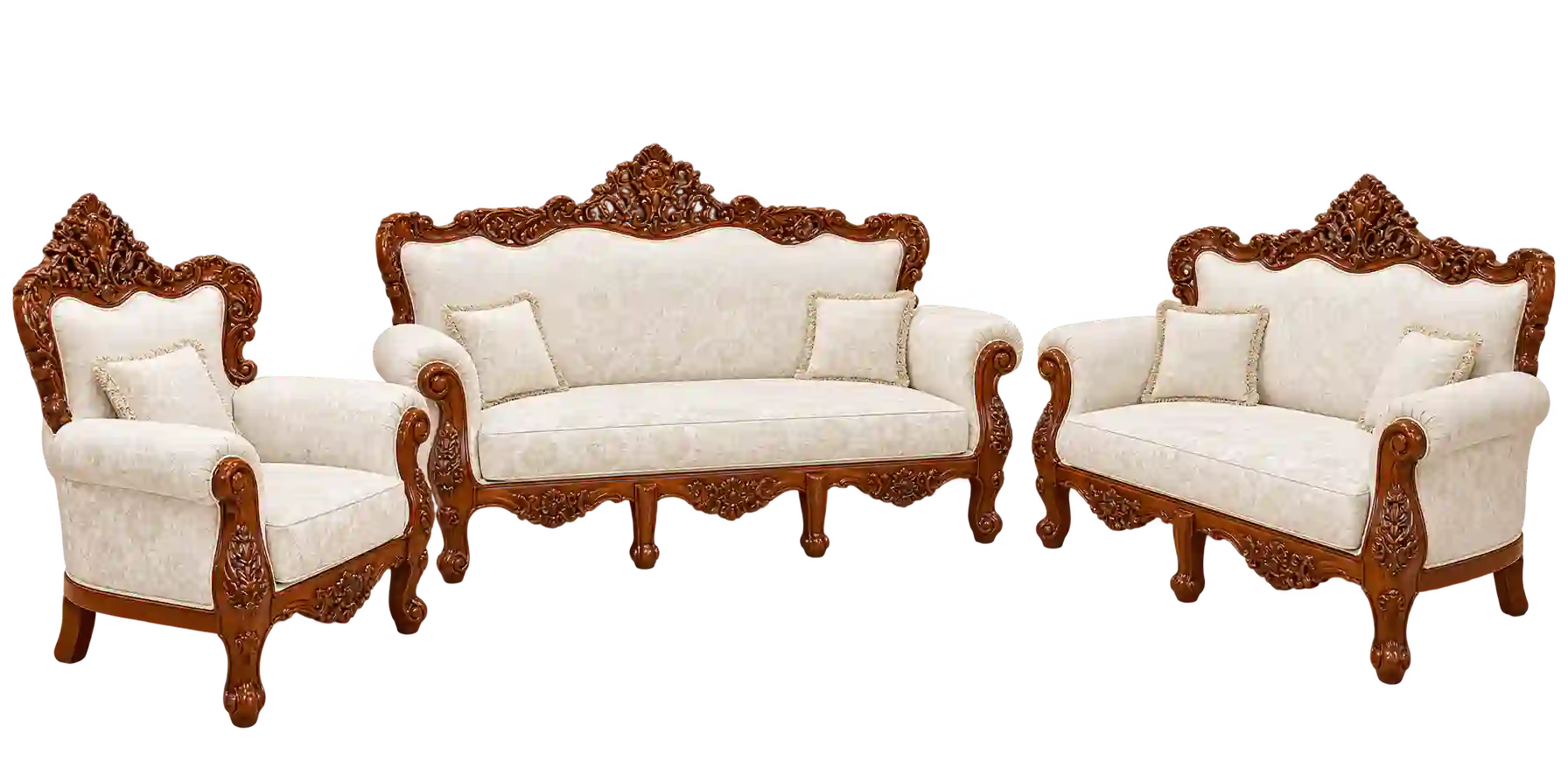 Classic carved wooden sofa set with patterned upholstery.