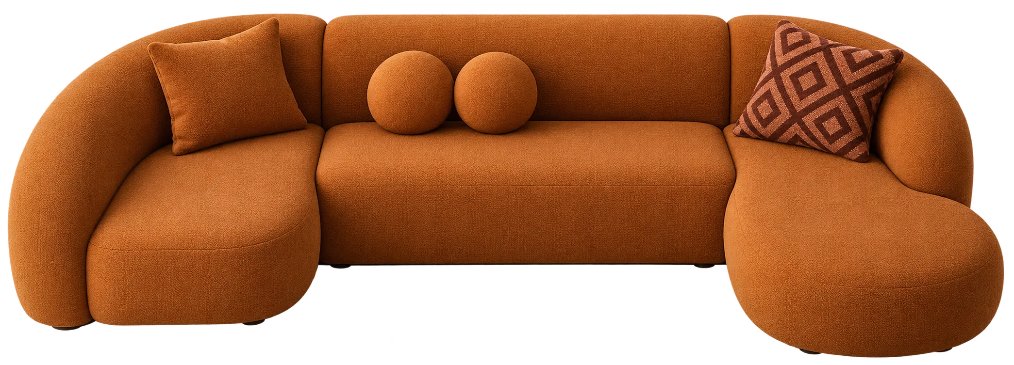 Curved cognac sofa with rounded armrests and decorative cushions.