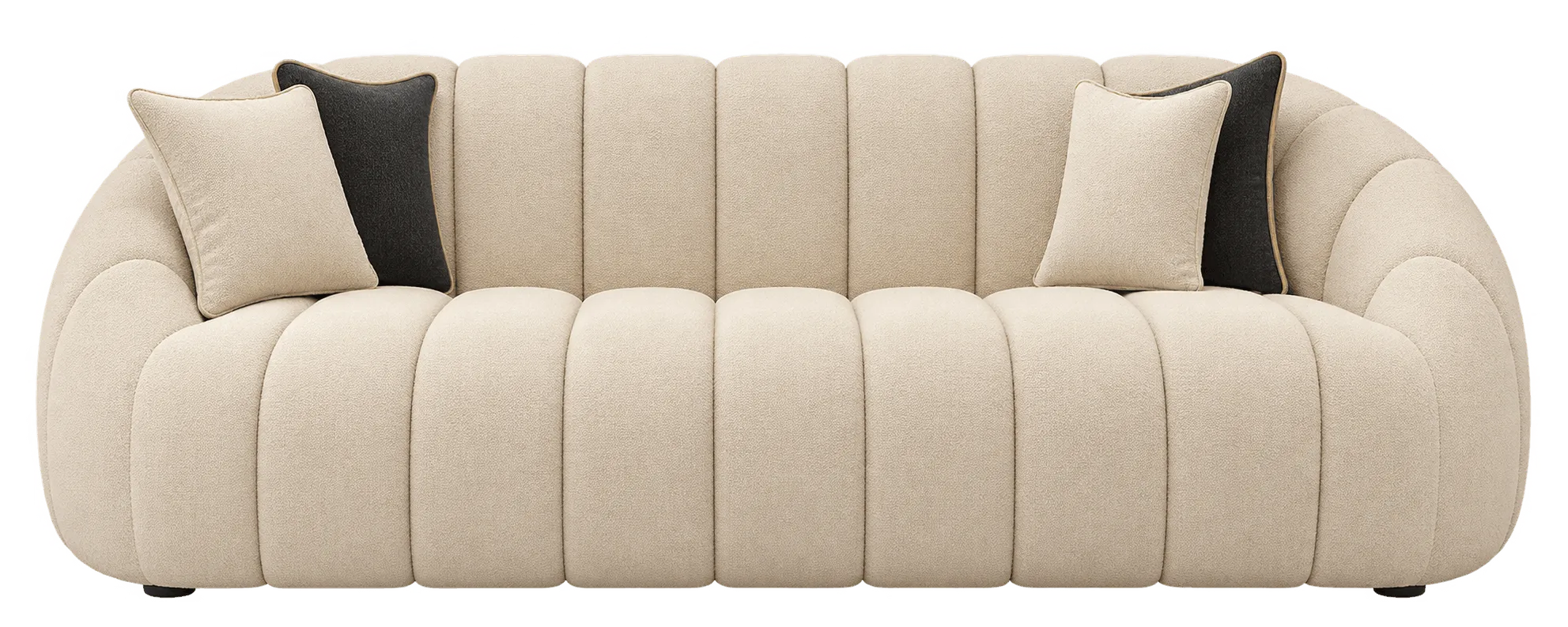 Cream sofa with rounded arms and channelled back cushions.